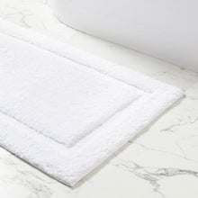 Load image into Gallery viewer, White bath mat on a marble floor