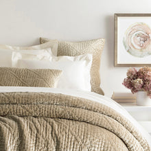 Load image into Gallery viewer, topaz shams on a bed with flowers and art next to the bed