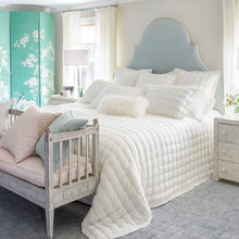 Load image into Gallery viewer, an airy room with the white linen puff of the bed