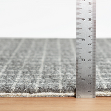 Load image into Gallery viewer, Ruler showing how tall the grey rug is. It's less than 0.75"