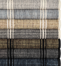 Load image into Gallery viewer, All the different colored rugs stacked on top of one another