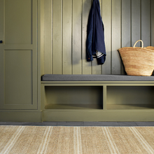 Load image into Gallery viewer, Natural rug in a green mud room