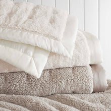 Load image into Gallery viewer, Grey fleece blanket topped with a white fleece throw