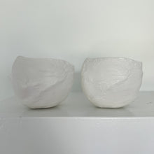 Load image into Gallery viewer, two plaster bowls next to one another on a shelf