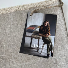 Load image into Gallery viewer, close up of the libeco place mat and the tag