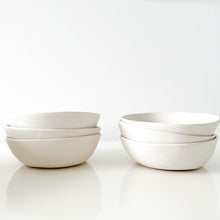 Load image into Gallery viewer, Two stacks of three white Alex Marhsall bowls on a white surface