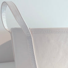 Load image into Gallery viewer, Close up of the handle of the white tote