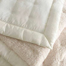 Load image into Gallery viewer, Close up of the back side of the white blanket