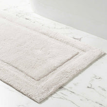 Load image into Gallery viewer, White rectangle bath mat on a marble floor