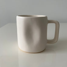 Load image into Gallery viewer, Close up of the white Alex Marshall mug on a white table