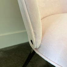 Load image into Gallery viewer, close up of the hardware of the pink chair 
