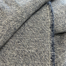 Load image into Gallery viewer, Close up of a blue and grey throw including the freyed seem
