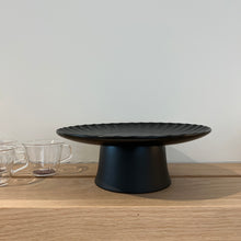 Load image into Gallery viewer, black cake stand on a shelf with glass expresso cups
