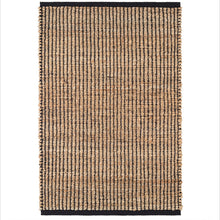 Load image into Gallery viewer, full picture of the black and wicker colored rug on a white floor
