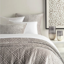 Load image into Gallery viewer, grey velvet quilt on a bed with vases and art next to the bed
