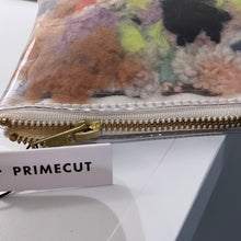 Load image into Gallery viewer, colorful pouch with an upclose viewpoint of the brass zipper and primecut tag
