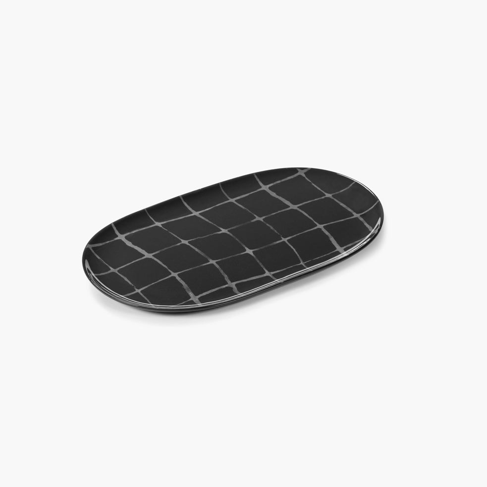 black and grey serving dish on a white background