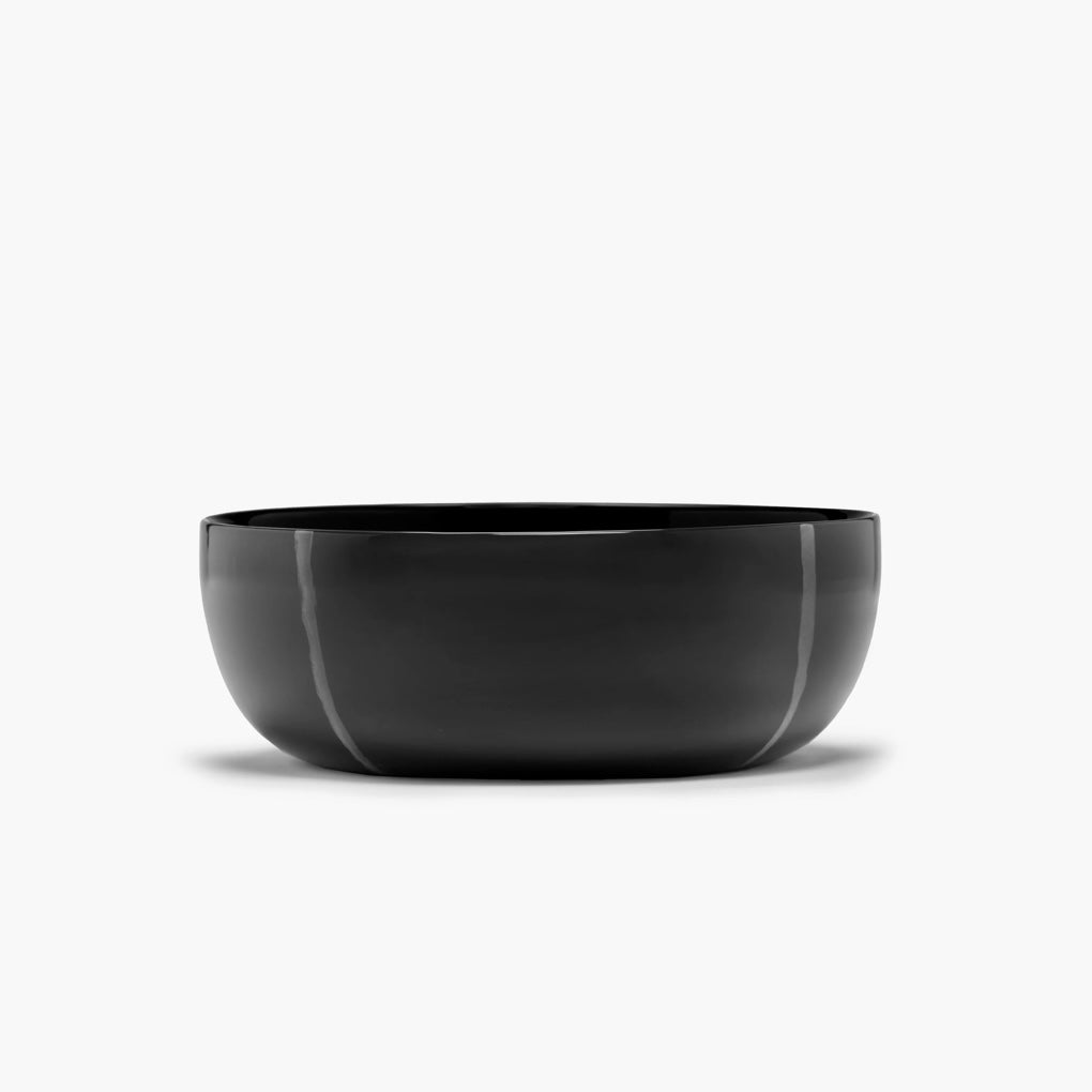 side view of the black bowl with a white background