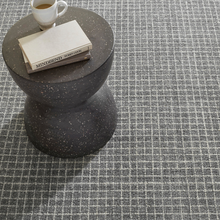Load image into Gallery viewer, Grey rug with a black table and books on top of it
