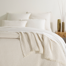 Load image into Gallery viewer, Plaster blanket on white bed setting
