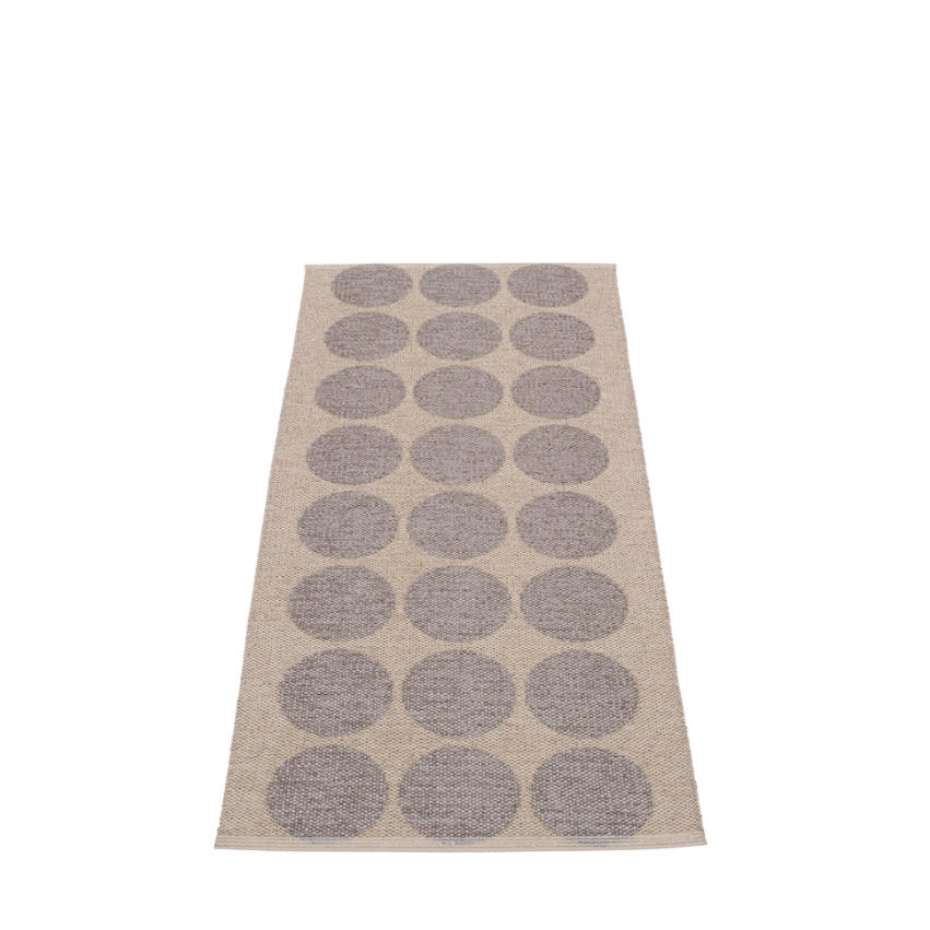 Reverse side of the mud metallic and mug colored rug with 8 rows of 3 dots on a white background
