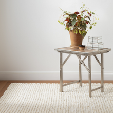 Load image into Gallery viewer, Bleached rug with a wooden table with a plant on it
