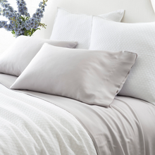Load image into Gallery viewer, grey pillow cases on a bed setting
