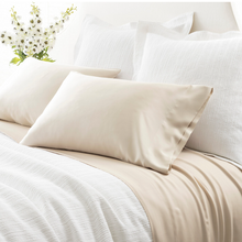 Load image into Gallery viewer, sand pillow cases on a white bed setting
