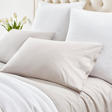 Load image into Gallery viewer, Dove grey sheets on a white bed setting
