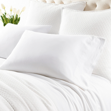Load image into Gallery viewer, white sheets on a white bed setting
