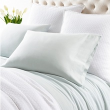 Load image into Gallery viewer, sky sheets on a white bed setting
