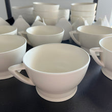 Load image into Gallery viewer, porcelain cups on a shelf with other ceramic items
