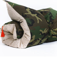 Load image into Gallery viewer, green camo and striped hedgehouse throw bed rolled up on a white background
