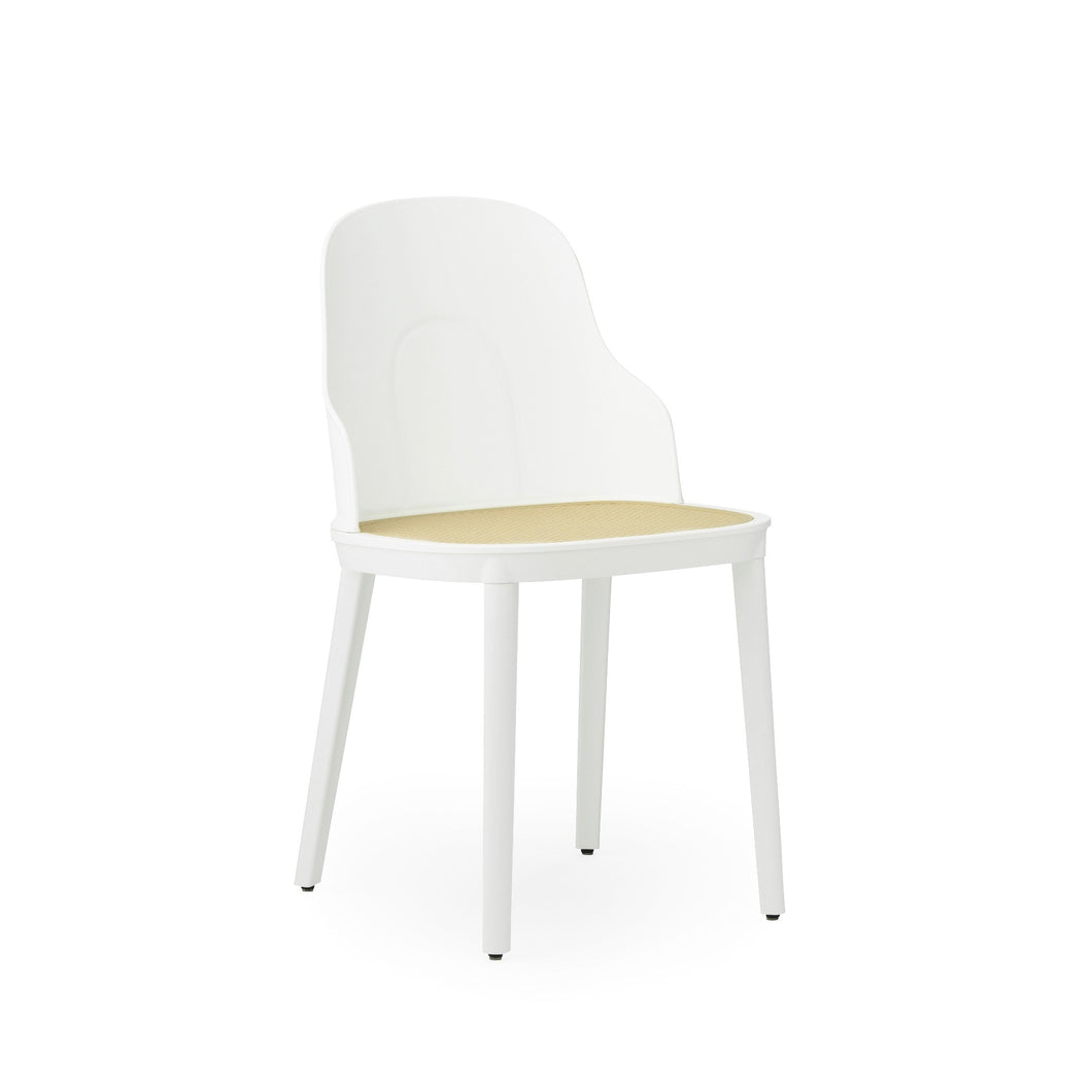 View from front angle of Normann Copenhagen  Allez Chair , White with wicker seat,