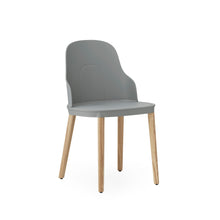 Load image into Gallery viewer, View from front angle of Normann Copenhagen Allez Chair grey with standard seat with oak legs,
