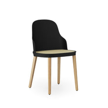 Load image into Gallery viewer, View from front angle of Normann Copenhagen Allez Chair , black with wicker seat and oak legs,

