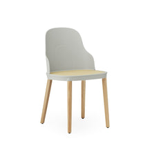 Load image into Gallery viewer, View from front angle of Normann Copenhagen Allez Chair , gray with wicker seat and oak legs,
