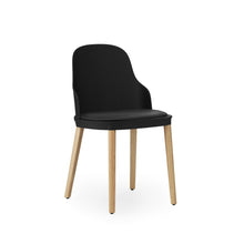 Load image into Gallery viewer, View from front angle of Normann Copenhagen Allez Chair black with leather seat and oak legs,
