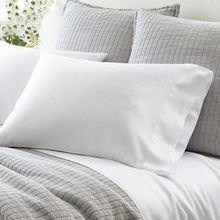 Load image into Gallery viewer, white pillow cases on a bed
