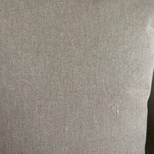 Load image into Gallery viewer, Close up of the back of the tan and leather pillow
