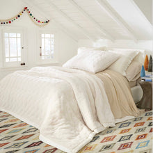 Load image into Gallery viewer, White bed with the throw as a comforter with many pops of color around the room
