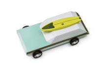 Load image into Gallery viewer, birds eye view of the wagon with the surfboard on top
