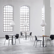 Load image into Gallery viewer, medium lights in a cafe with wooden tables and black chairs 
