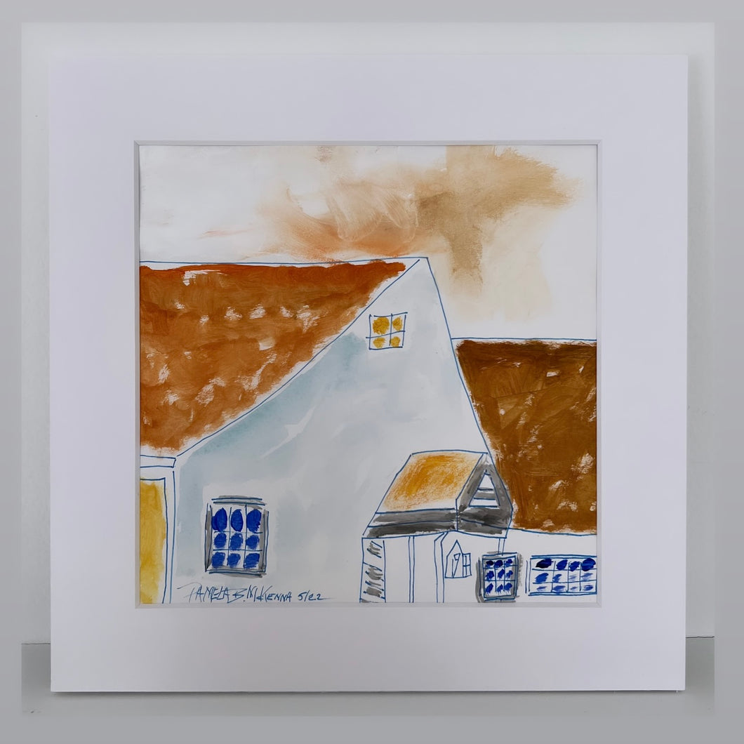 yellow house print with a white mat on a shelf