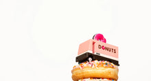 Load image into Gallery viewer, wooden donut truck from candylab on a stack of donuts
