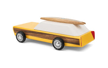 Load image into Gallery viewer, A posterior view of the yellow and wooden toy car from Candylab
