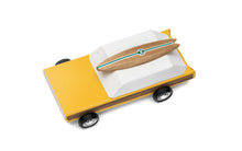 Load image into Gallery viewer, Birdseye view of the yellow and wooden toy car from Candylab
