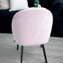 Load image into Gallery viewer, back of the pink chair on a rug
