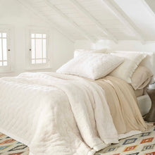 Load image into Gallery viewer, White bed with the white fleece blanket on top
