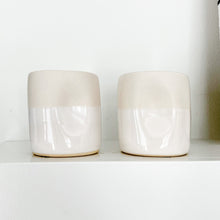 Load image into Gallery viewer, White and cream Alex Marshall tumbler on a white shelf
